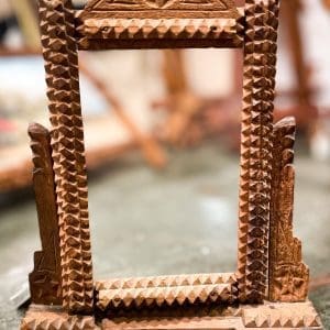 Small free standing tramp art frame $130