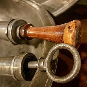 18th-century syringe and medical equipment. Large wooden handle $95, smaller $75